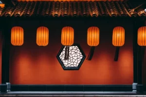 Traditional Chinese lanterns on red wall for spring cleaning decoration